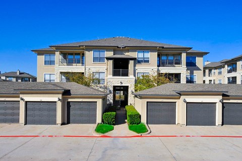 Attached garage parking for residents at Cypress Lake at Stonebriar Apartments, Frisco 75034