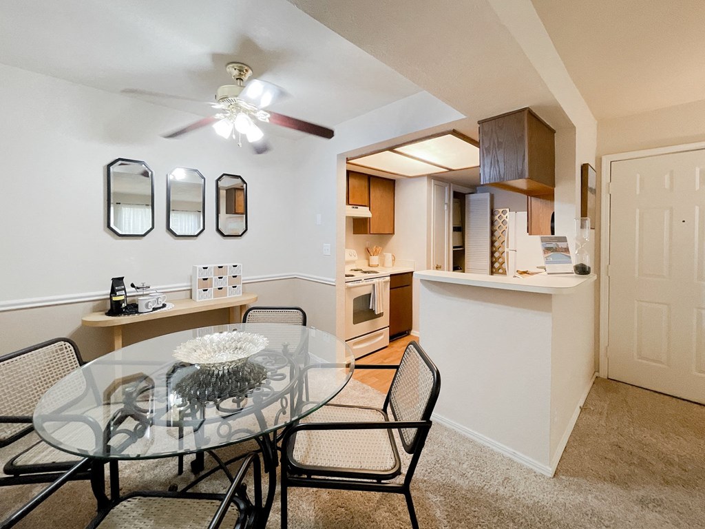 Dining room view with white walls at Greenbriar Apartments, Oklahoma