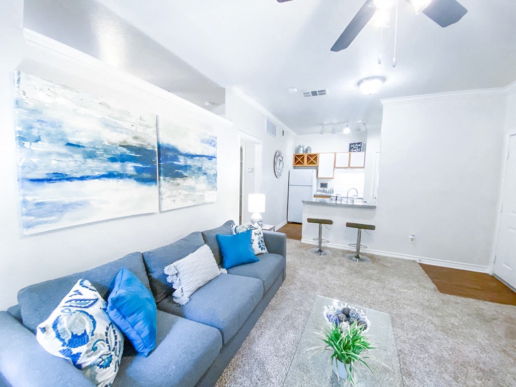 Living room view with kitchen counter top at Tuscany Square, Dallas, TX