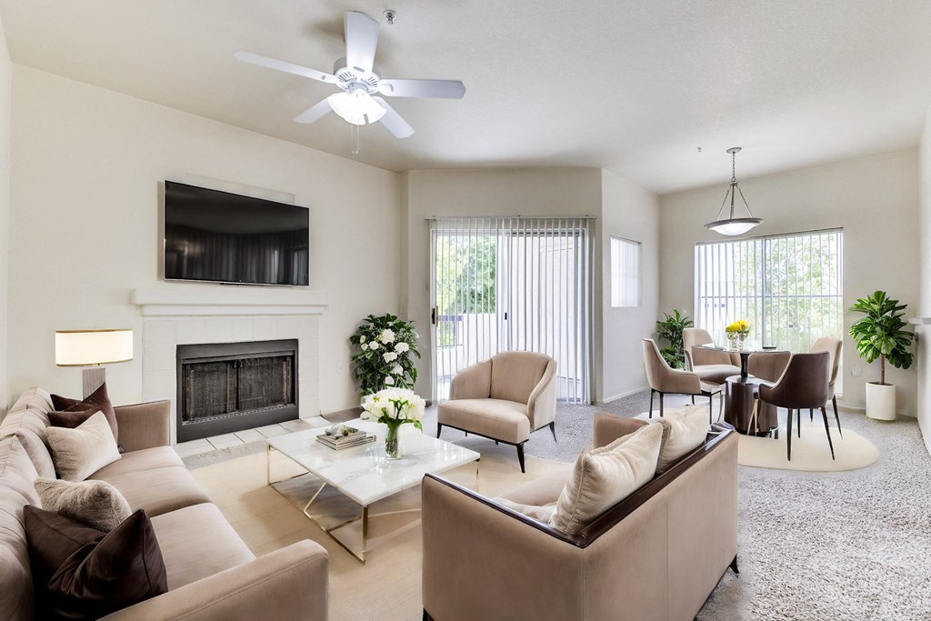 Living room with high ceilings and fireplace at Ventana, Scottsdale, Arizona