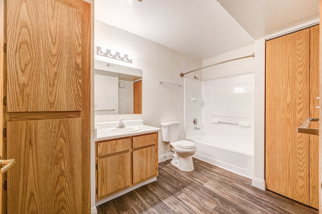 Bathroom vanity and wooden closets at Country Club at The Meadows, Las Vegas, NV