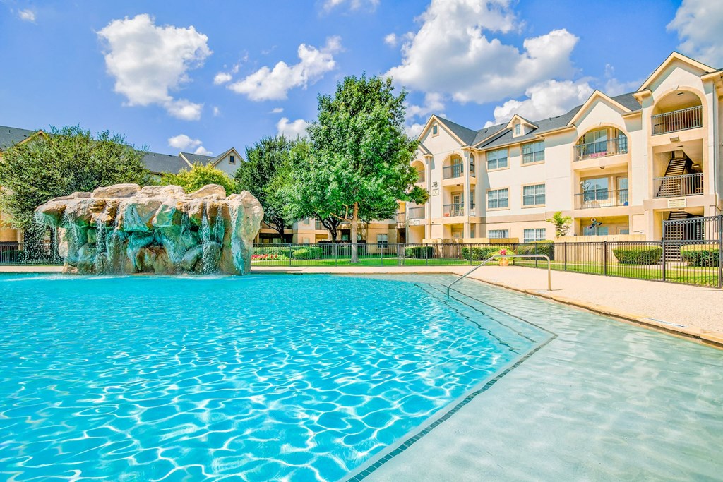Resort-style pool on a sunny day at Tuscany Square, Dallas, Texas
