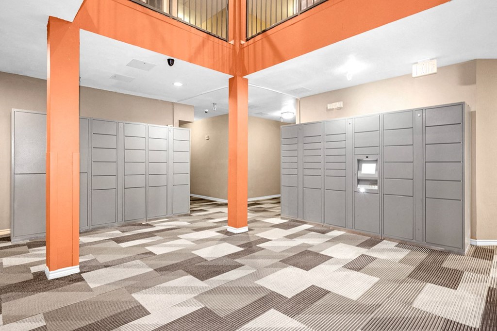 Package locker room with checkered flooring at Villas at Katy Trail Apartments, Dallas, 75201