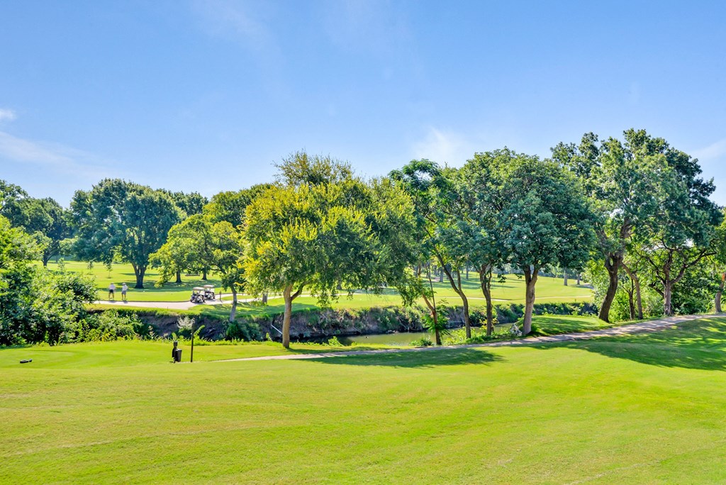 Golf course view with trees at Turnberry Isle Apartment Homes, Dallas, TX, Texas
