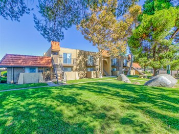 Mature landscaping at Woodlake Apartments in Escondido, CA, For Rent. Now leasing Studio, 1 and 2 bedroom apartments. - Photo Gallery 5