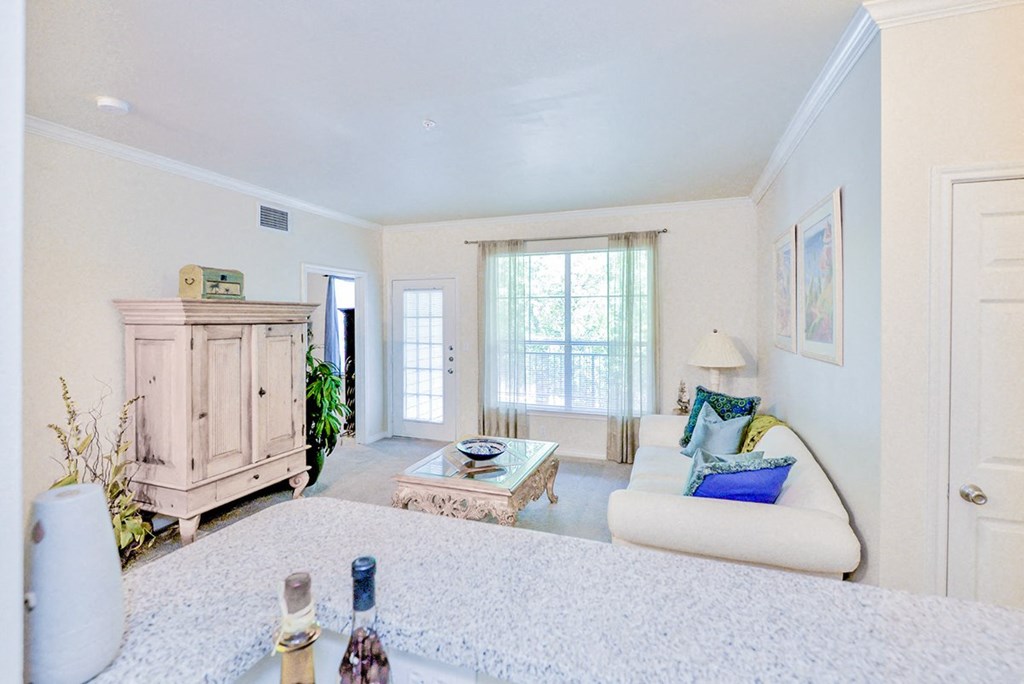 a living room with a couch and a table