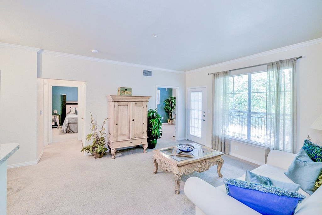a living room with a couch and a table