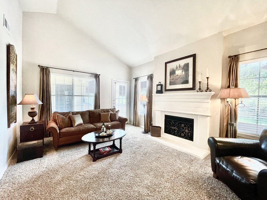 Large living room with tall ceilings at SaddleBrook Apartments, Dallas