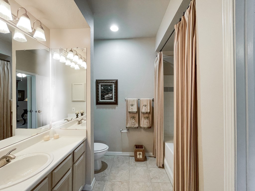 Spacious bathroom with large vanity at SaddleBrook Apartments, Dallas, 75248