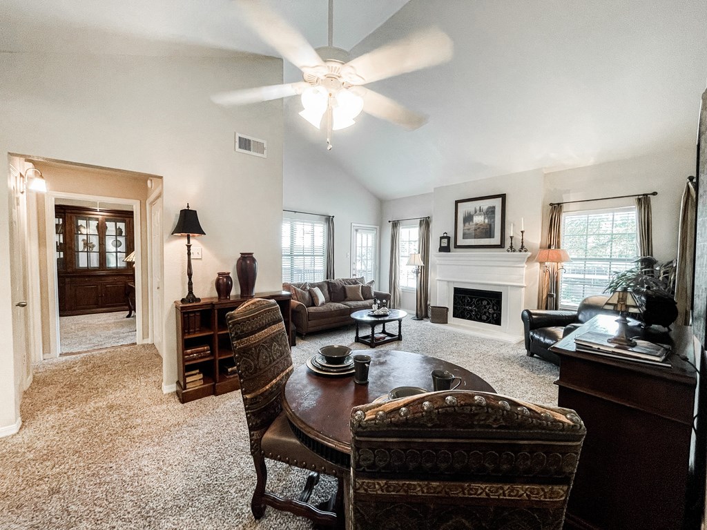 Open concept dining and living room area at SaddleBrook Apartments, Dallas