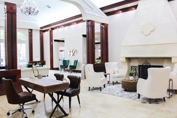 Leasing Office at Montfort Place Apartments. Two large couches and two emerald green chairs. Montfort Place in North Dallas, TX, For Rent. Now leasing 1 and 2 bedroom apartments. - Photo Gallery 23