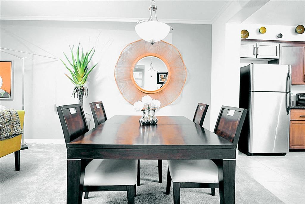 Modern dining room with a wooden table at Croix Townhomes, Henderson, NV, Nevada, 89014