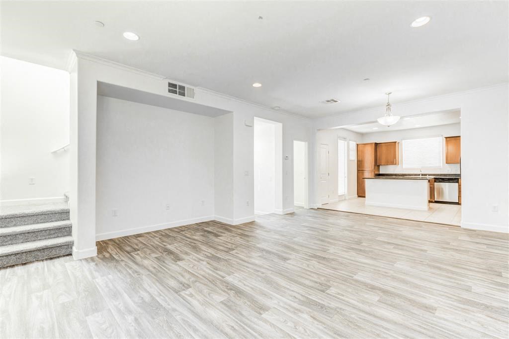 Spacious living room with wood flooring at Croix Townhomes, Nevada