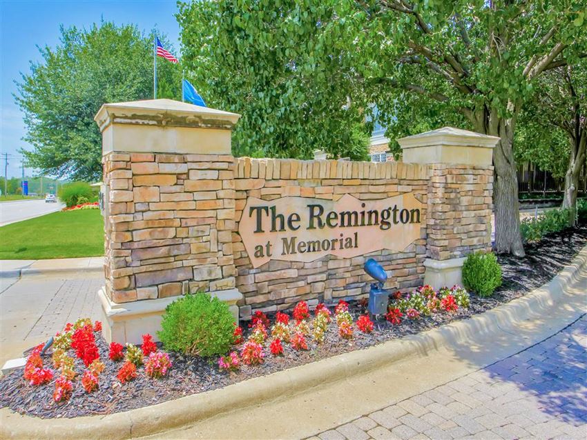 Upscale entrance to The Remington at Memorial in Tulsa, OK, For Rent. Now leasing 1 and 2 bedroom apartments. - Photo Gallery 1