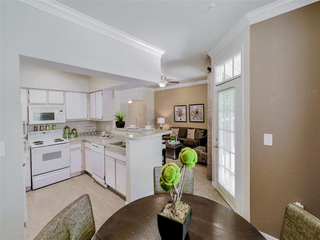 Dishwasher and open concept floor plan of Montfort Place in North Dallas, TX, For Rent. Now leasing 1 and 2 bedroom apartments.