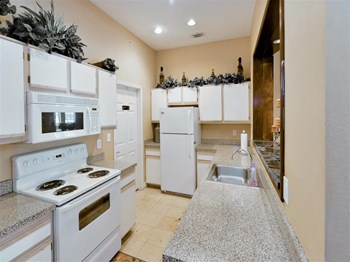 Spacious kitchen storage of Montfort Place in North Dallas, TX, For Rent. Now leasing 1 and 2 bedroom apartments. - Photo Gallery 10