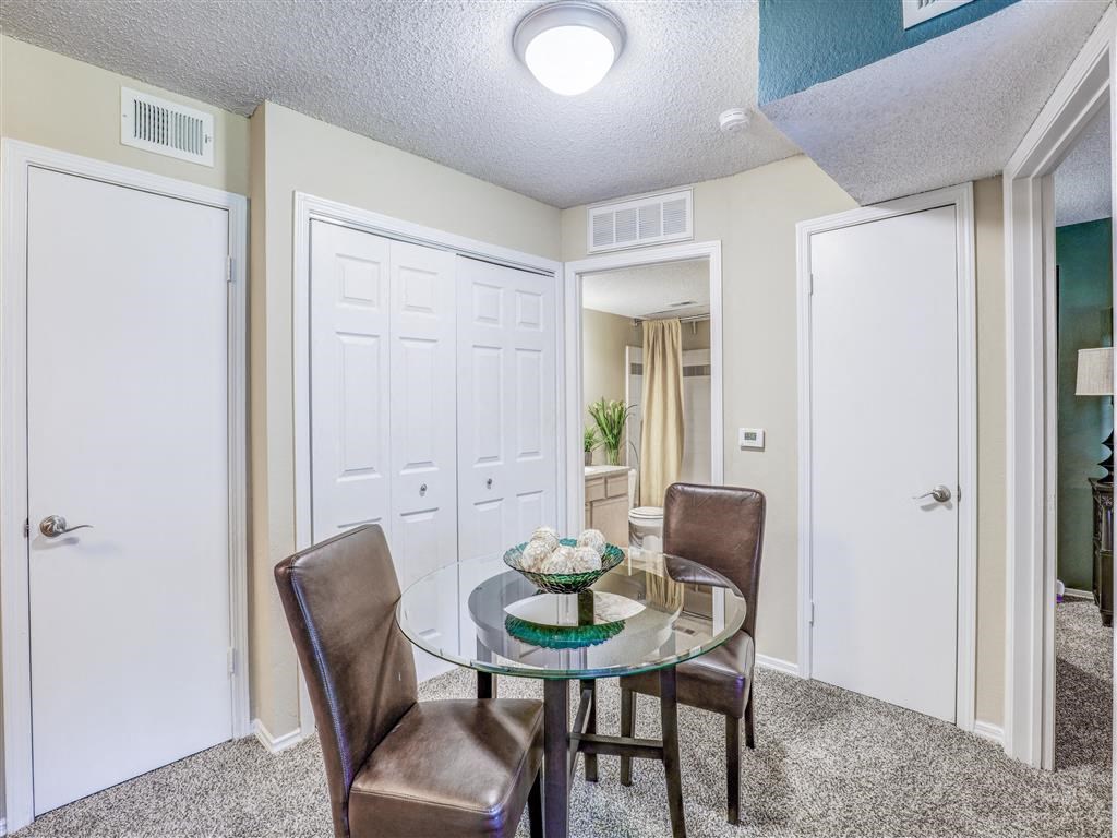Dining room at Trinity Square Apartments in North Dallas, TX, For Rent. Now leasing 1 and 2 bedroom apartments.