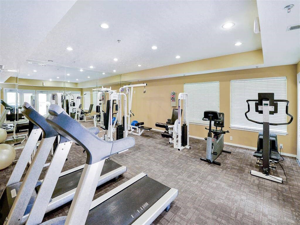 Cardio equipment at gym of The Villas at Katy Trail in Uptown Dallas, TX, For Rent. Now leasing Studio, 1, 2 and 3 bedroom apartments.