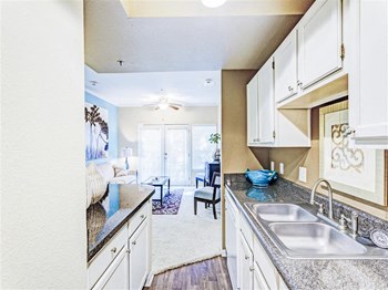 Gourmet kitchen with dishwasher at The Villas at Katy Trail in Uptown Dallas, TX, For Rent. Now leasing Studio, 1, 2 and 3 bedroom apartments. - Photo Gallery 8