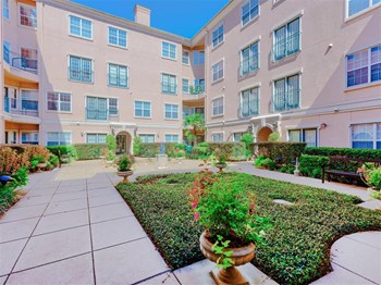Peaceful courtyards at The Villas at Katy Trail in Uptown Dallas, TX, For Rent. Now leasing Studio, 1, 2 and 3 bedroom apartments. - Photo Gallery 5