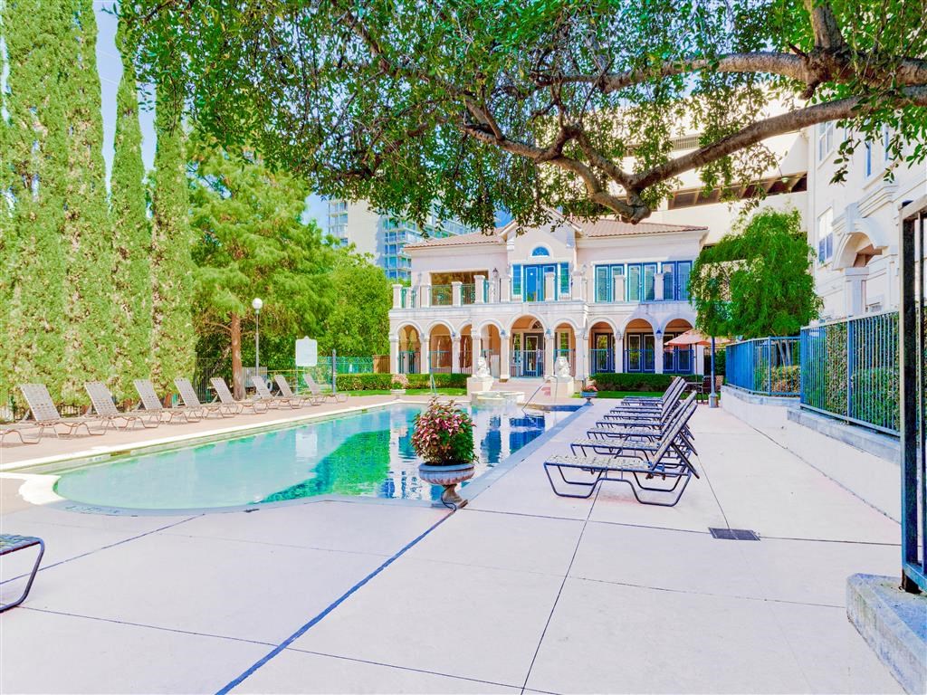 Gated pool and sundeck at The Villas at Katy Trail in Uptown Dallas, TX, For Rent. Now leasing Studio, 1, 2 and 3 bedroom apartments.