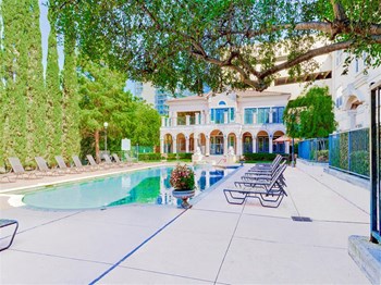 Gated pool and sundeck at The Villas at Katy Trail in Uptown Dallas, TX, For Rent. Now leasing Studio, 1, 2 and 3 bedroom apartments. - Photo Gallery 13