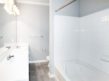 Garden tub double vanity bathroom Estancia Apartments for rent