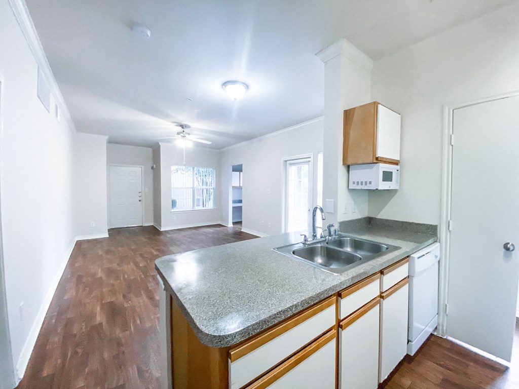 Open concept kitchen and living room at Tuscany Square, Dallas, TX, 75287