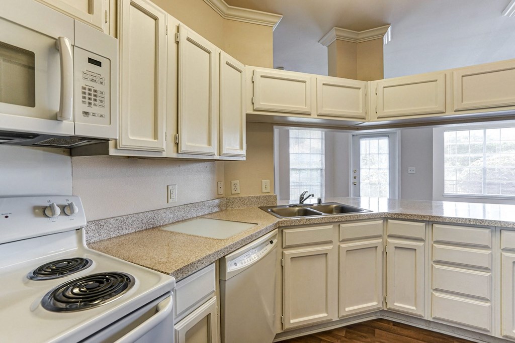 Large kitchens with ample storage space at Turnberry Isle Apartment Homes, Dallas, TX, Texas
