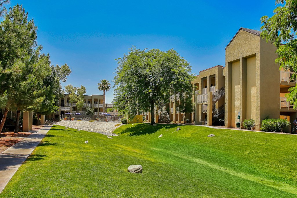 Community Exterior and Green Walkways at Pavilions at Pantano Apartments, Arizona, 85710