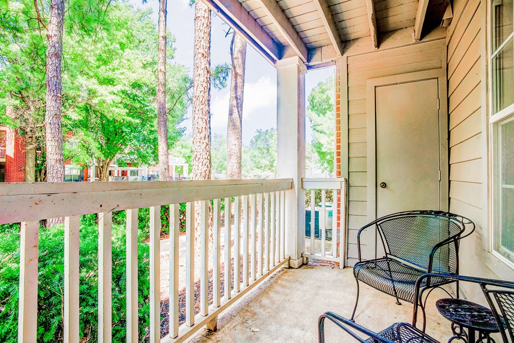 Private balcony with black chairs at Greenbriar Apartments, Tulsa, Oklahoma
