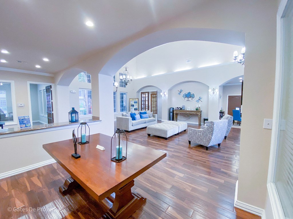 Interior clubhouse view with white archways at Gates de Provence Apartments, Dallas, TX, 75287