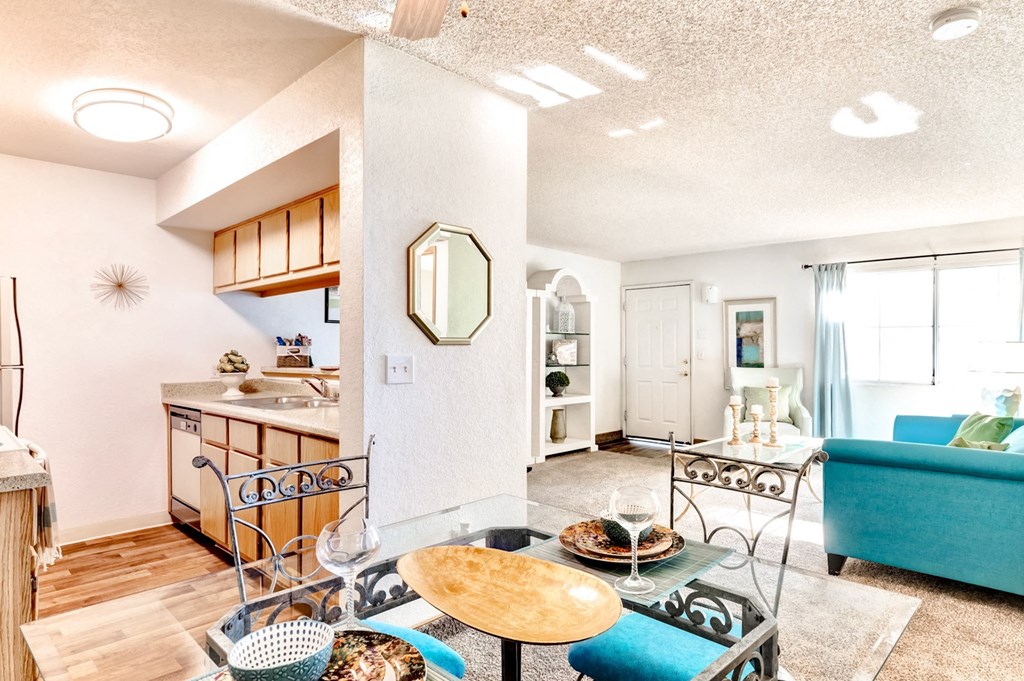 Living room with blue chairs and sofa at Country Club at The Meadows, Las Vegas, NV, 89107