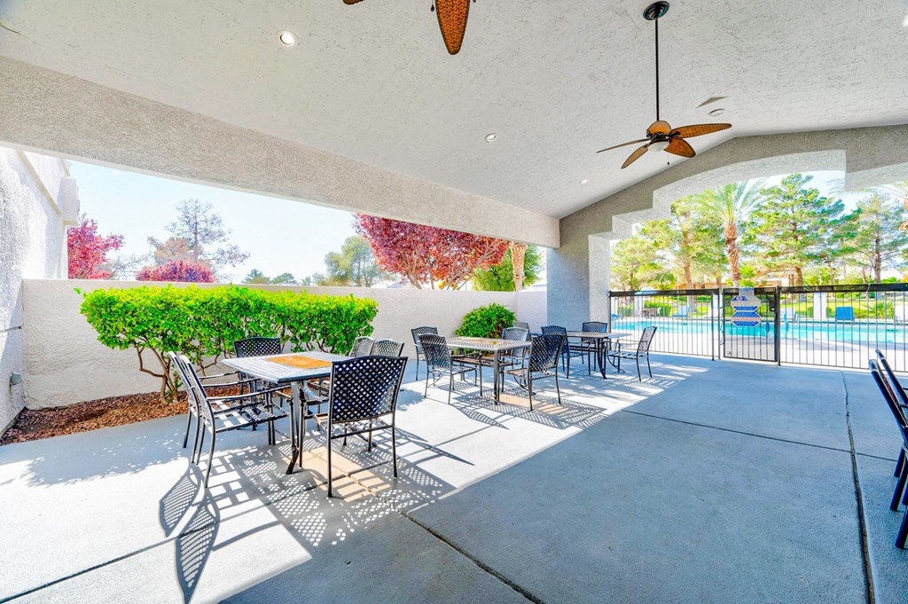 Covered lounge area by the pool at Country Club at The Meadows, Nevada