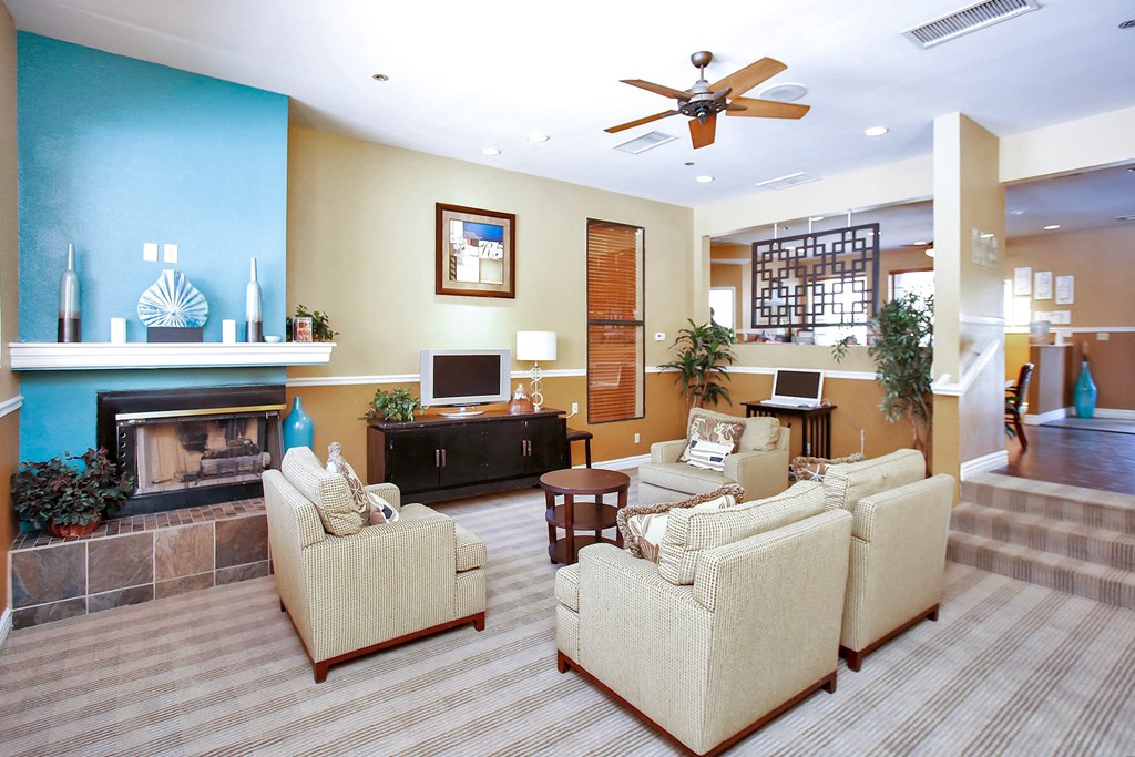 Television And Fireplace In Living Room at Pavilions at Pantano Apartments, Arizona