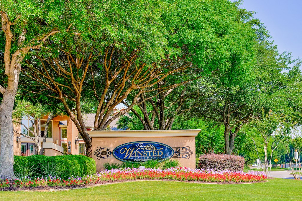 Property signage with trees at Winsted at Valley Ranch, Texas