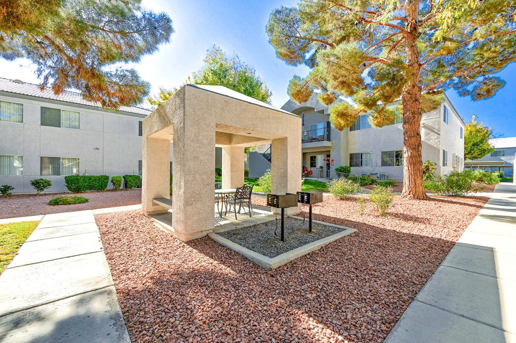 Exterior of apartment with courtyard and gazeebo at Country Club at The Meadows, Las Vegas