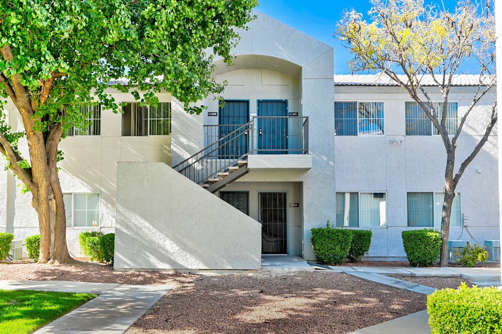 Exterior of apartment with stairs and trees at Country Club at The Meadows, Las Vegas, NV, Nevada, 89107