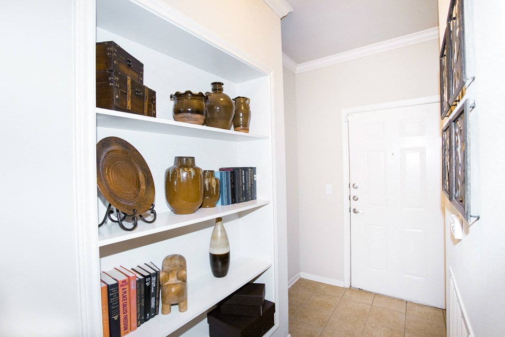Interior view of apartment with built in bookshelf at Sonoma Grande Apartments, Oklahoma