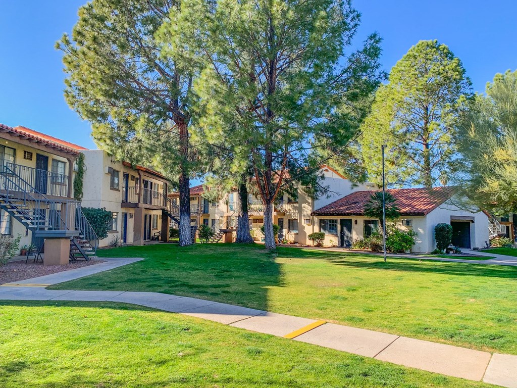 Lush Green Courtyard With Walking Paths at La Hacienda Apartment, Tucson, AZ, Arizona