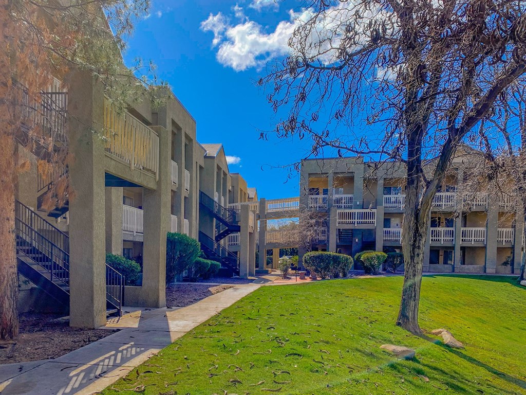 Green lawn and trees at Pavilions at Pantano Apartments, Tucson, AZ, 85710