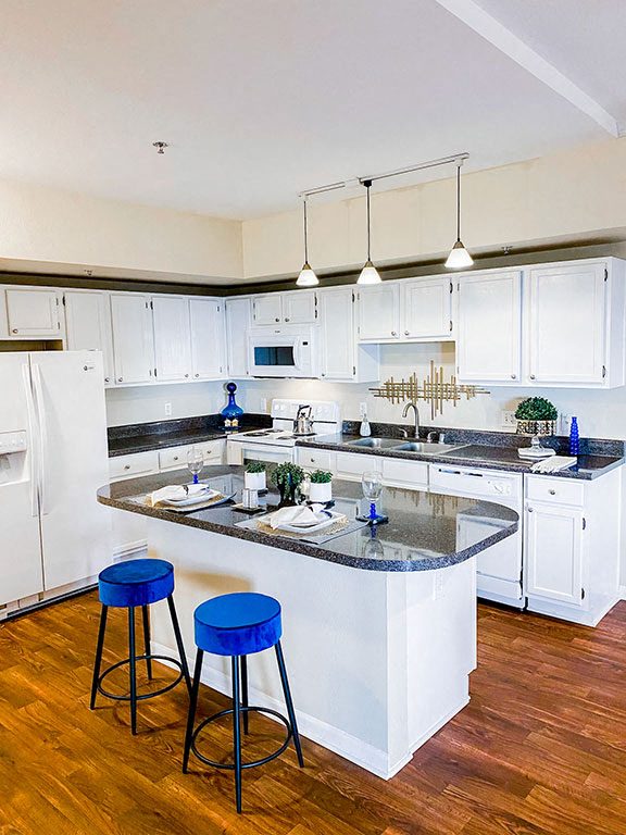 Gourmet kitchen with island at The Villas at Katy Trail in Uptown Dallas, TX, For Rent. Now leasing Studio, 1, 2 and 3 bedroom apartments.