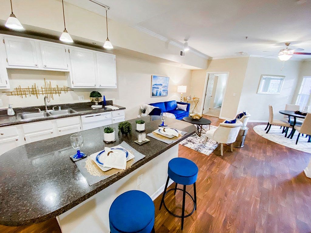 Open kitchen with dining nook at The Villas at Katy Trail in Uptown Dallas, TX, For Rent. Now leasing Studio, 1, 2 and 3 bedroom apartments.