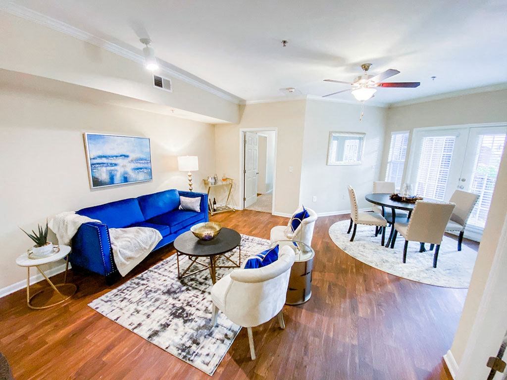 Dining and living room at The Villas at Katy Trail in Uptown Dallas, TX, For Rent. Now leasing Studio, 1, 2 and 3 bedroom apartments.