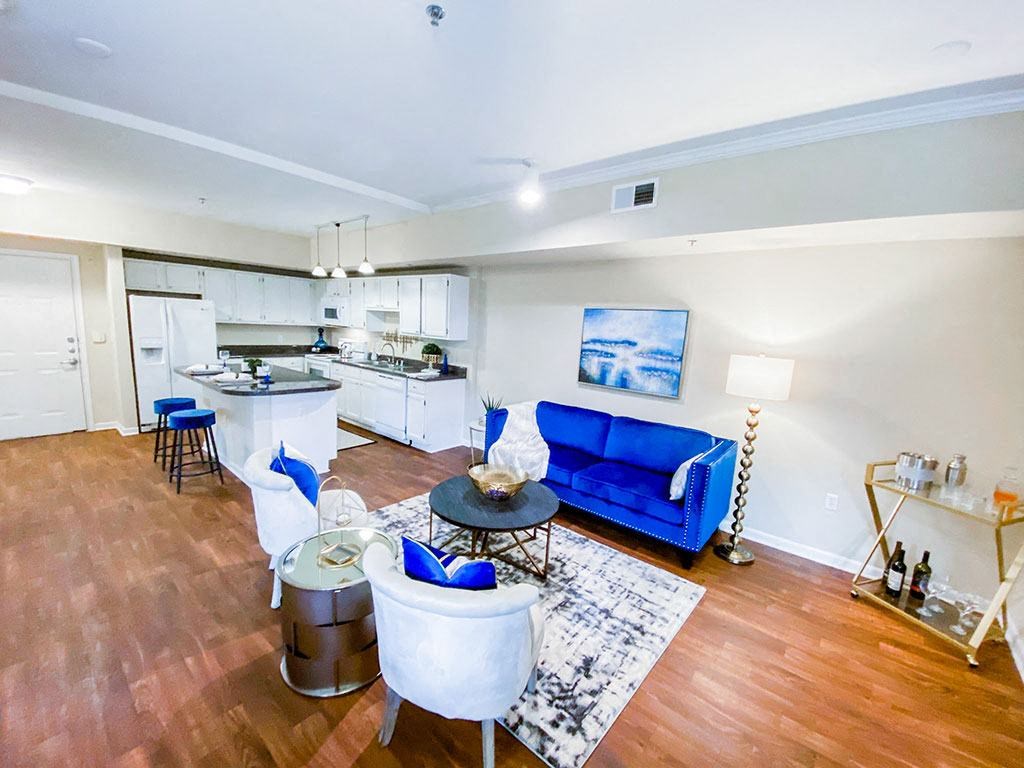 Living Room and Kitchen at The Villas at Katy Trail in Uptown Dallas, TX, For Rent. Now leasing Studio, 1, 2 and 3 bedroom apartments.