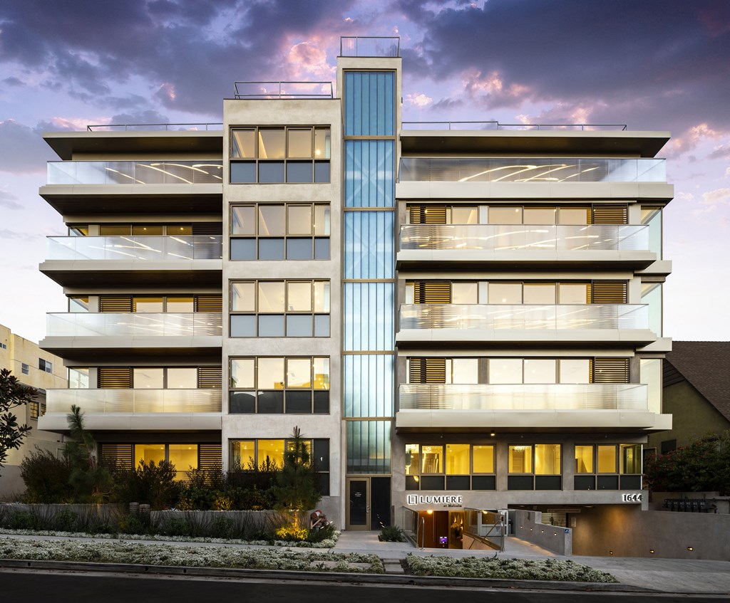 a rendering of an apartment building on a city street