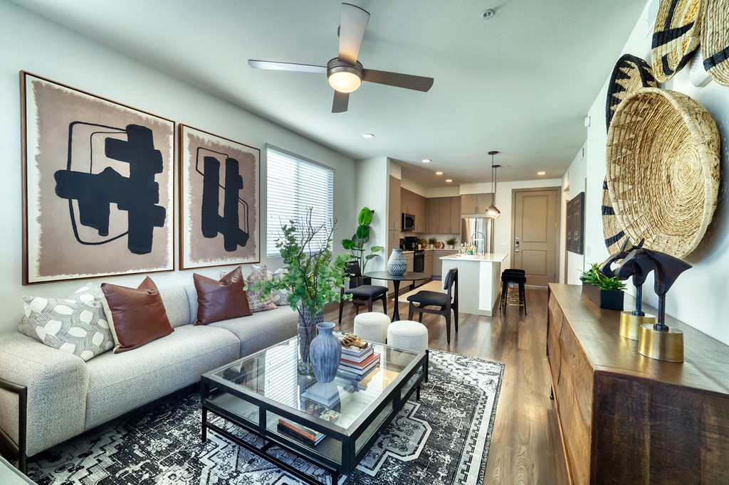 a living room with a couch and a coffee table at Elevation at the Village, Gilbert Arizona  