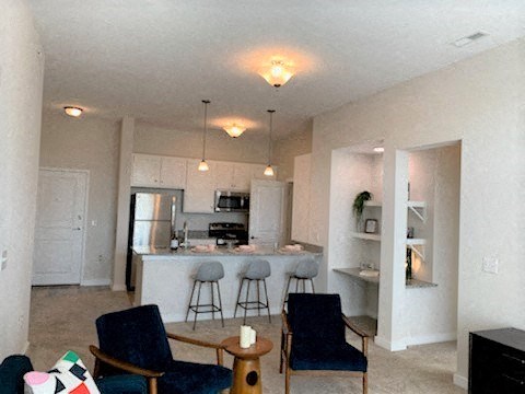 Living Space and bistro bar kitchen