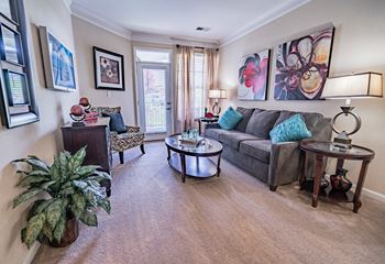 a living room with a couch and a table