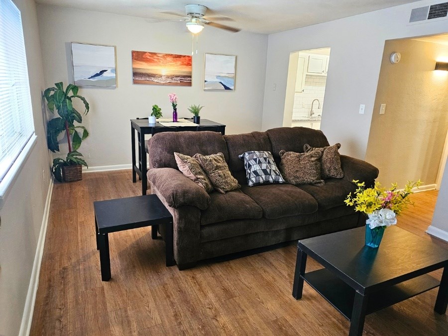 a living room with a couch and a table